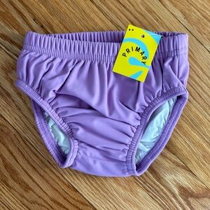 NWT Primary 18-24 swim diaper and rash guard